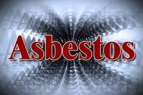 red asbestos text on a blurry background
